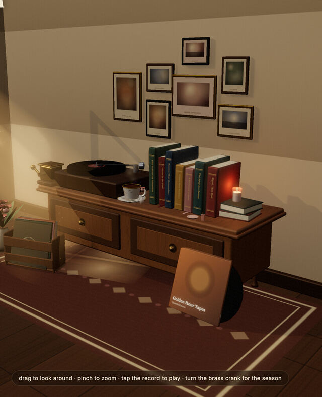 Close on the record player, gallery wall and books